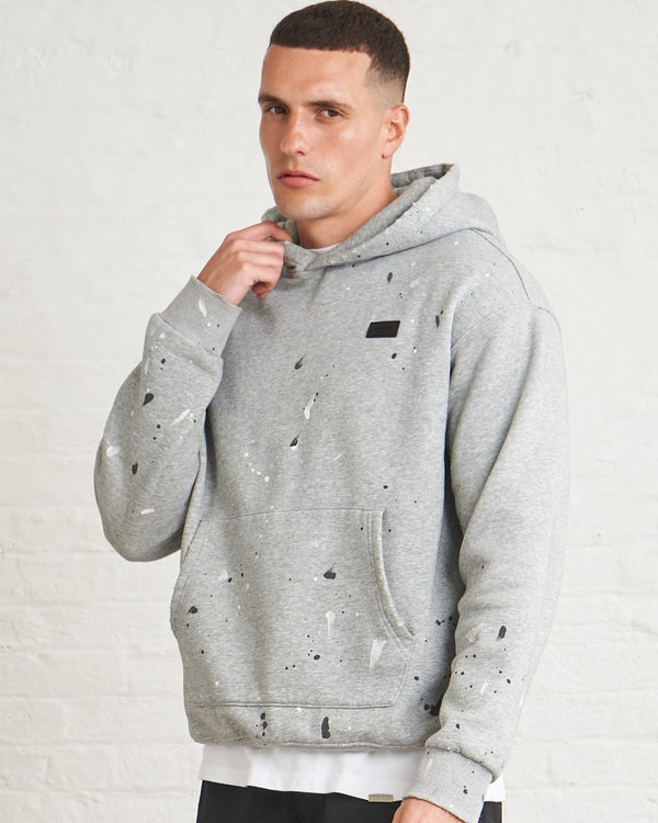 DISTRESSED PAINT SPLATTER HOODIE